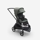 Bugaboo Dragonfly seat stroller with black chassis, forest green fabrics and forest green sun canopy.