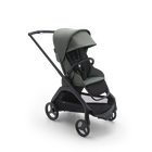 Bugaboo Dragonfly seat stroller with black chassis, forest green fabrics and forest green sun canopy.