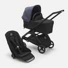 Bugaboo Dragonfly Liegewannen- und Sitz-Kinderwagen mit schwarzem Fahrgestell, mitternachtsschwarzem Stoff und sturmblauem Sonnendach.