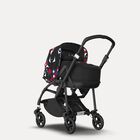 Bugaboo Bee 6 bassinet and seat stroller black base, black fabrics, animal explorer red/blue sun canopy