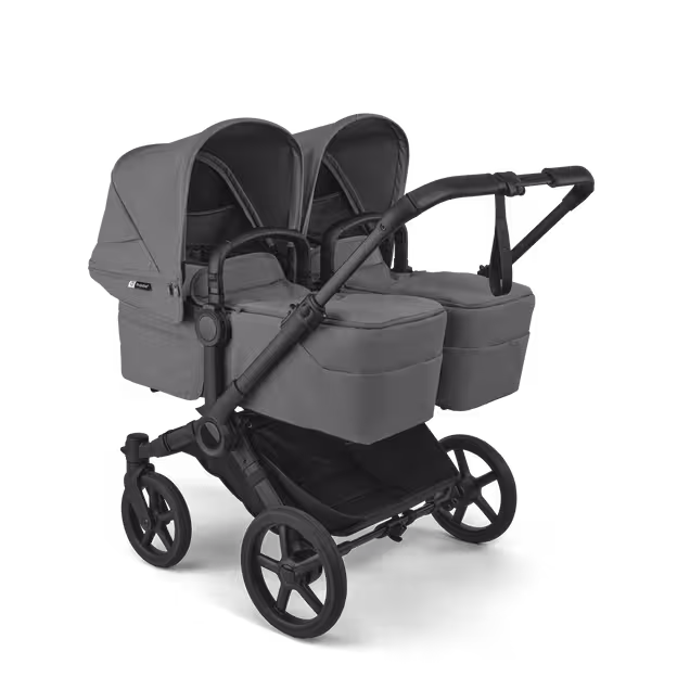 Bugaboo Donkey 6 twin stroller black base, moon grey fabrics, moon grey sun canopy view 1 - Main Image Slide 1 of 9