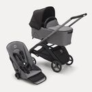 Poussette siège et nacelle Bugaboo Dragonfly avec châssis graphite, habillages gris chiné et capote nuit noire.