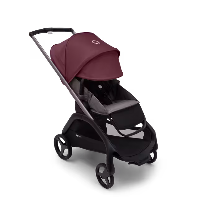 ブラックのシャーシ、グレーメランジのファブリック、グレーメランジのサンキャノピーを装着したバガブー ドラゴンフライ シートストローラー。 最大限に伸長させたサンキャノピー。 - Main Image Slide 3 of 16