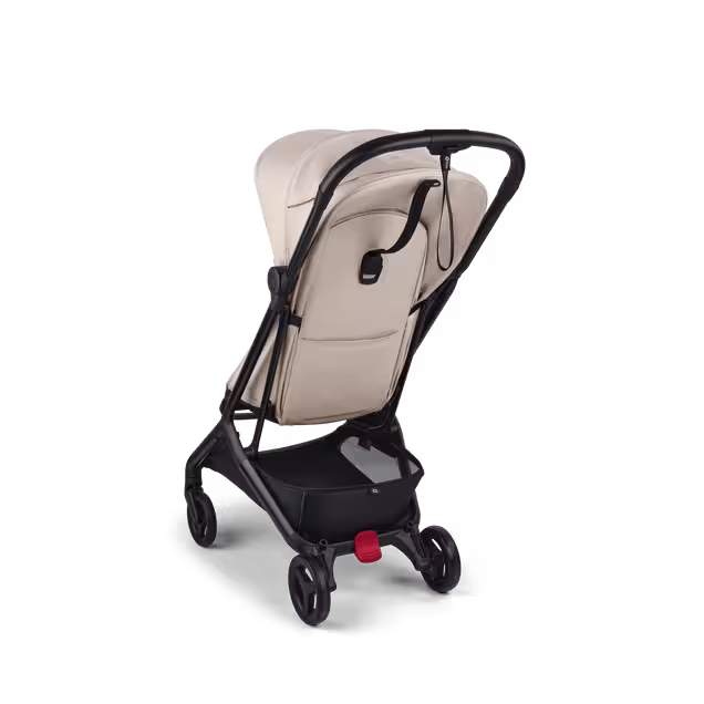 View from the back of a Bugaboo Butterfly 2 ultra-compact travel pram with black chassis, Desert Taupe fabrics, and Desert Taupe sun canopy. - Main Image Slide 3 of 9