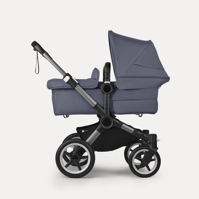 Bugaboo Donkey 5 twin stroller graphite base, stormy blue fabrics, stormy blue sun canopy - Main Image Slide 2 of 12
