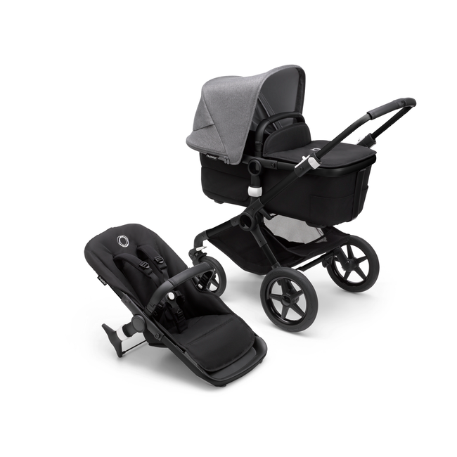 Bugaboo Fox 3 bassinet and seat stroller with black frame, black fabrics, and grey sun canopy.