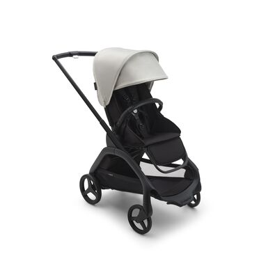 Carrito con silla Bugaboo Dragonfly con chasis negro, fundas negro medianoche y capota blanco niebla.