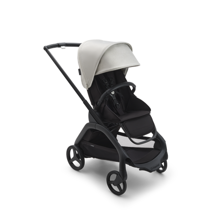 Bugaboo Dragonfly seat stroller with black chassis, midnight black fabrics and misty white sun canopy. - view 1