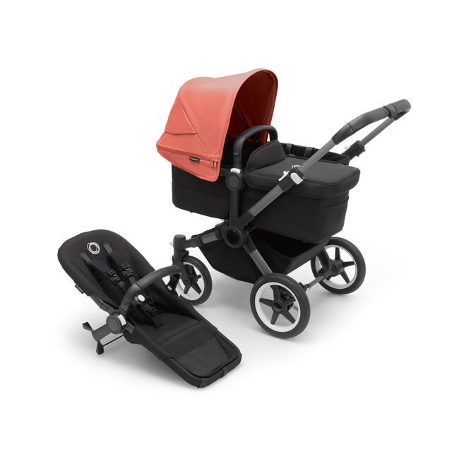Bugaboo Donkey 5 Mono bassinet stroller with graphite chassis, midnight black fabrics and sunrise red sun canopy, plus seat. - Main Image Slide 1 of 13