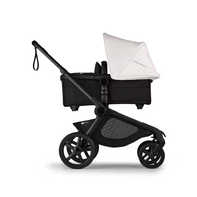 Side view of Bugaboo Kangaroo 2-in-1 stroller with one bassinet, Midnight Black fabrics, and Misty White sun canopy. - Main Image Slide 2 of 18