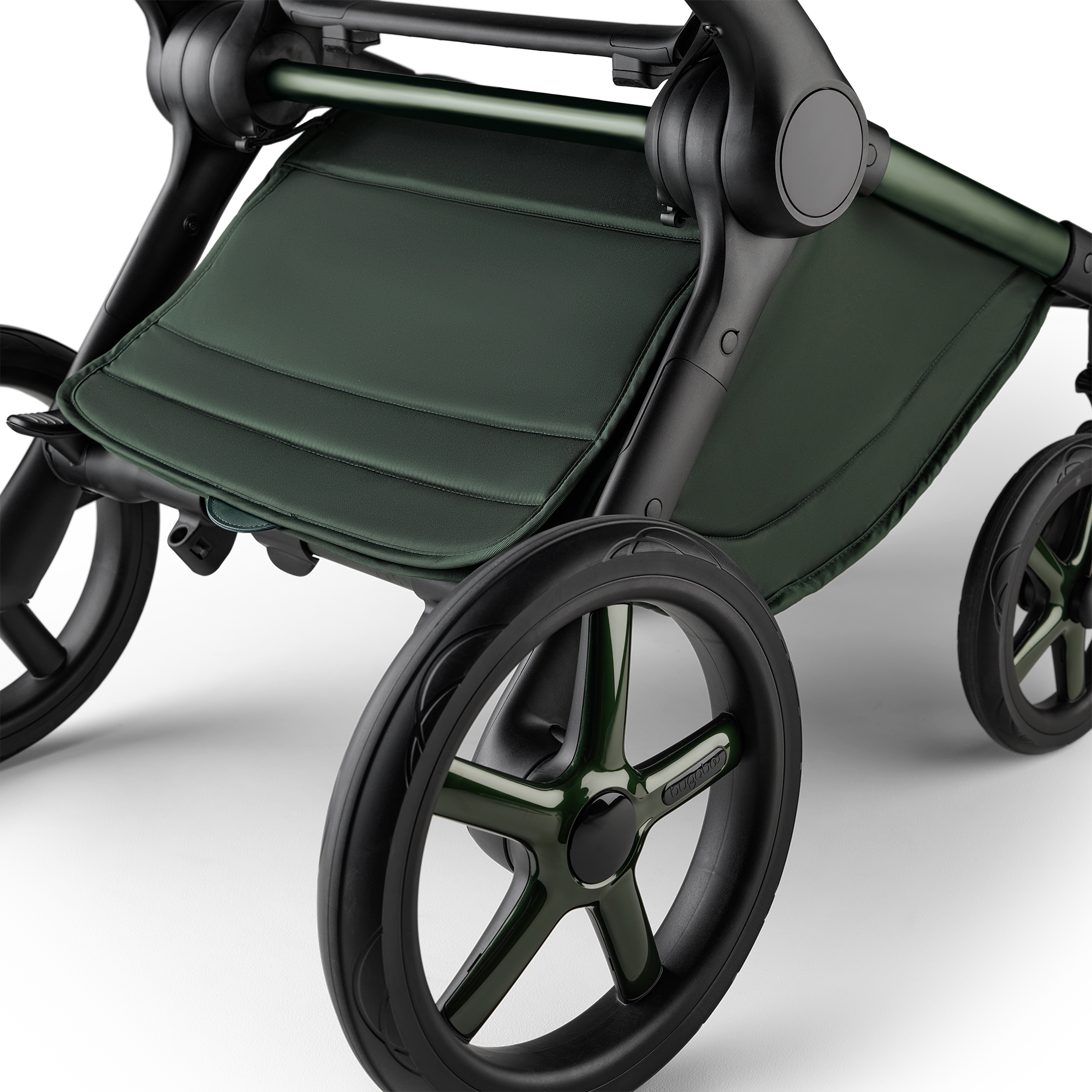 A close up of the underseat basket of the Bugaboo Fox 5 Noir Limited Edition stroller in Midnight Green. - Thumbnail Slide 6 of 15