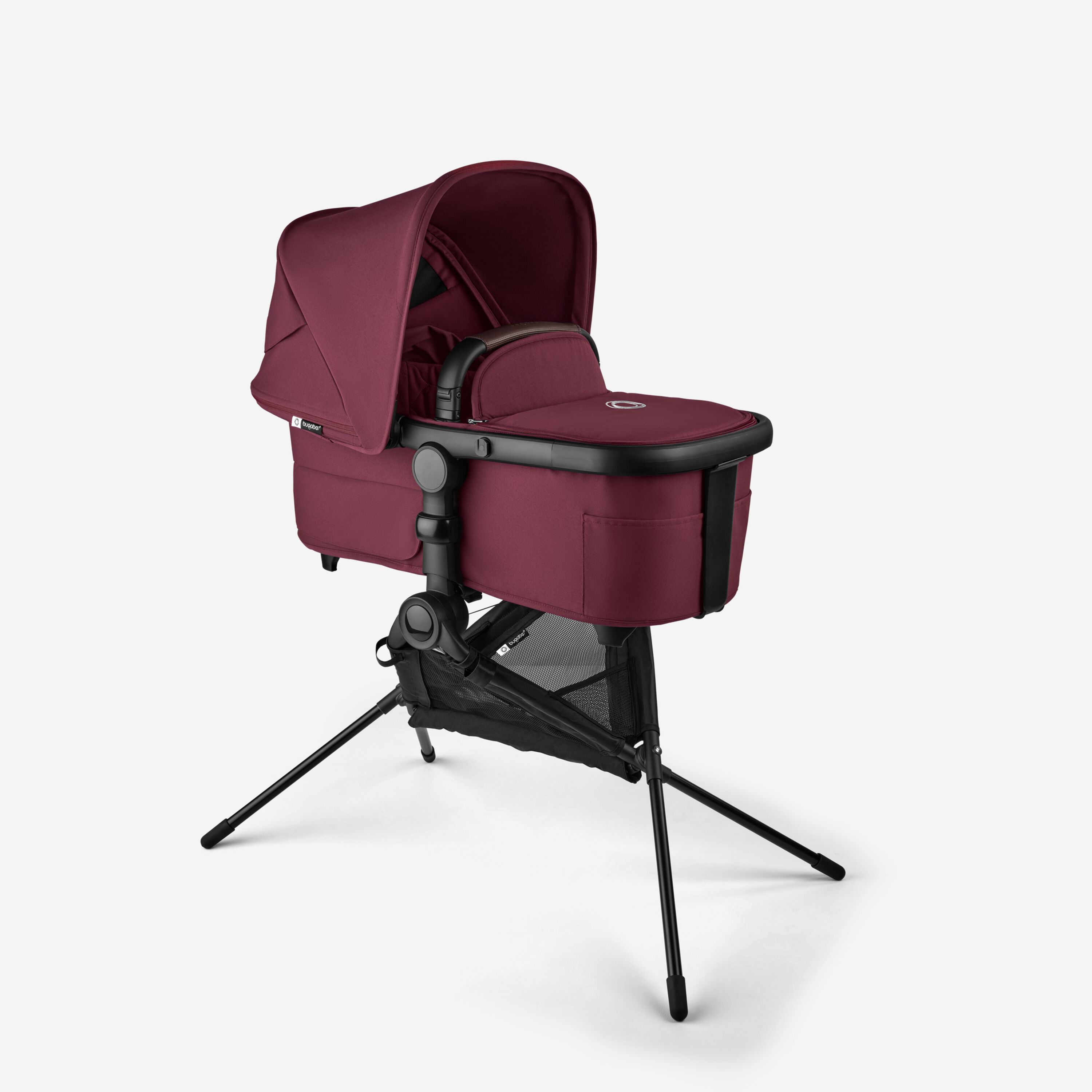A Bugaboo Kangaroo bassinet with a sun canopy placed on a Bugaboo bassinet stand. - Main Modal Image Slide 18 of 18