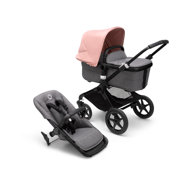 Bugaboo Fox 3 bassinet and seat stroller with black frame, grey fabrics, and pink sun canopy.