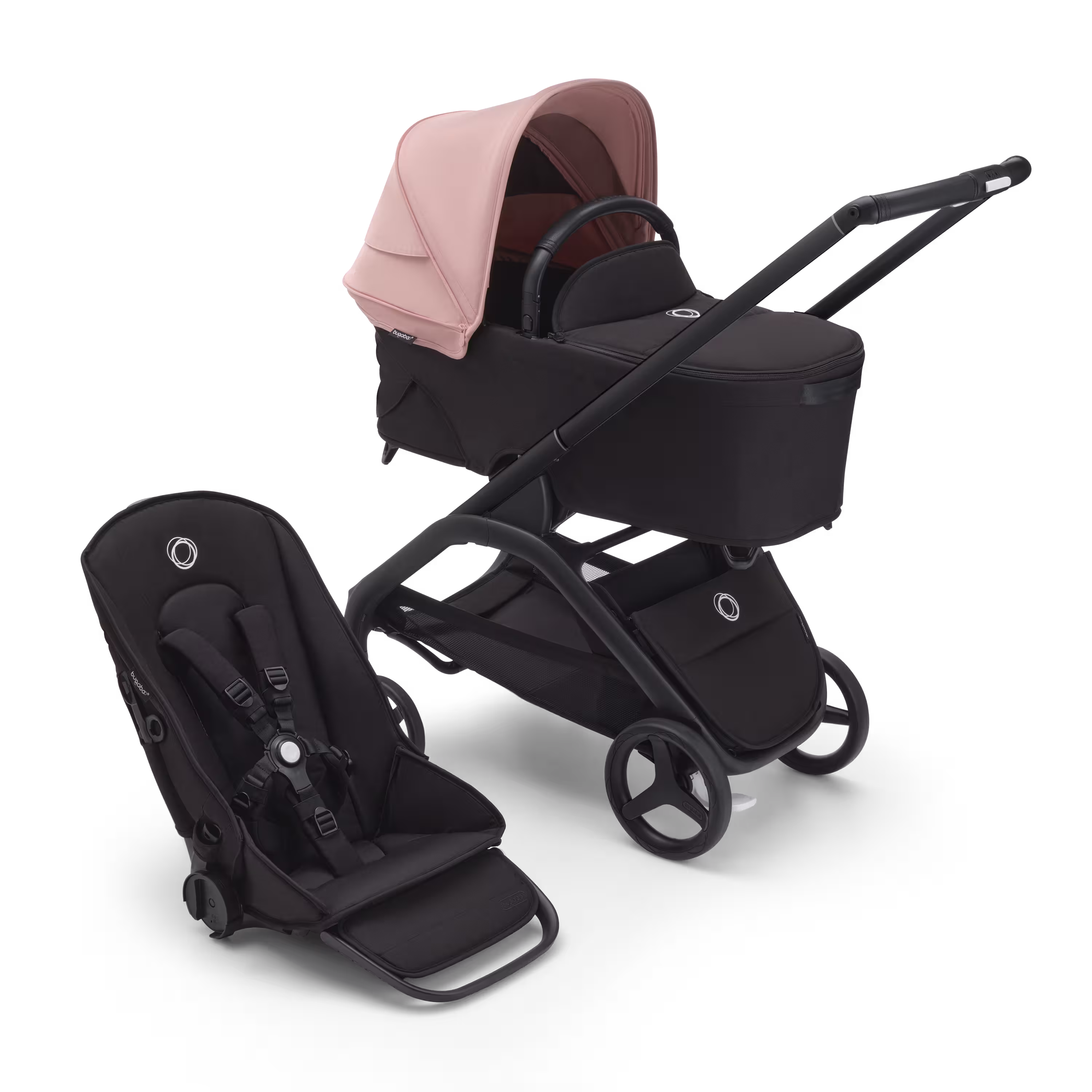 Bugaboo Dragonfly bassinet and seat stroller with black chassis, midnight black fabrics and morning pink sun canopy. - Main Modal Image Slide 1 of 16