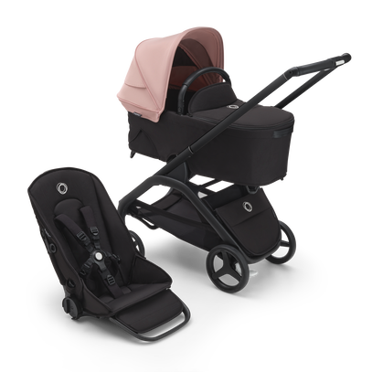 Bugaboo Dragonfly bassinet and seat stroller with black chassis, midnight black fabrics and morning pink sun canopy.