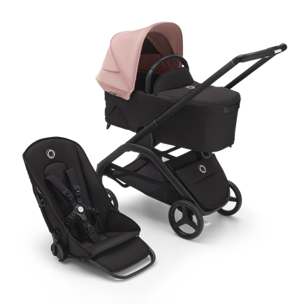 Bugaboo Dragonfly bassinet and seat stroller with black chassis, midnight black fabrics and morning pink sun canopy.