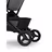 A close up of the rear wheels of the Bugaboo Butterfly 2 travel pushchair. - Thumbnail Slide 7 of 8