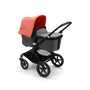 Bugaboo Fox 3 bassinet stroller with black frame, grey melange fabrics, and red sun canopy. - Thumbnail Slide 2 of 7