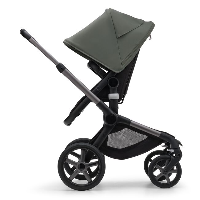 Side view of the Bugaboo Fox 5 seat pram with black chassis, forest green fabrics and forest green sun canopy.