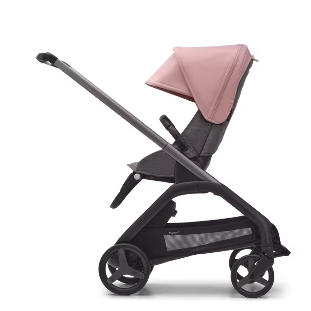 Vista laterale del passeggino Bugaboo Dragonfly con seduta e telaio graphite, tessuti grey melange e cappottina morning pink. - Main Image Slide 2 of 16