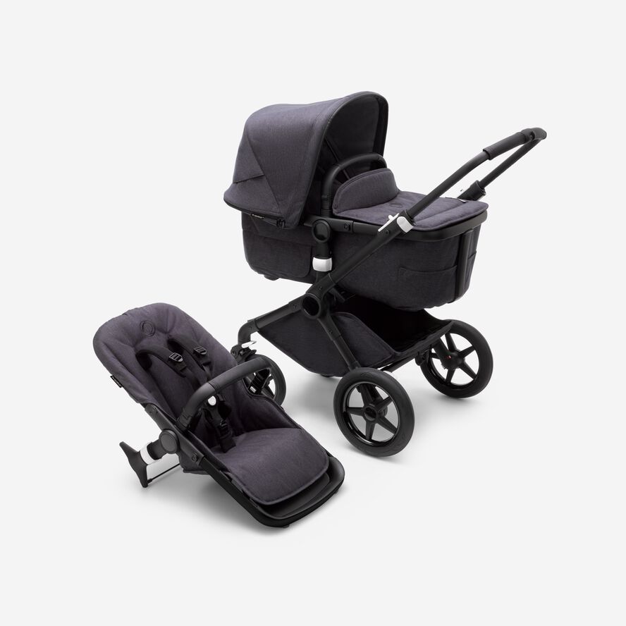 Bugaboo Fox 3 bassinet and seat stroller with black frame, mineral black fabrics, and mineral black sun canopy.