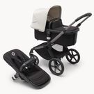 Poussette siège et nacelle Bugaboo Fox 5 avec châssis graphite, habillages nuit noire et capote blanc brume.