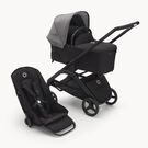 Bugaboo Dragonfly bassinet and seat stroller with black chassis, midnight black fabrics and grey melange sun canopy.