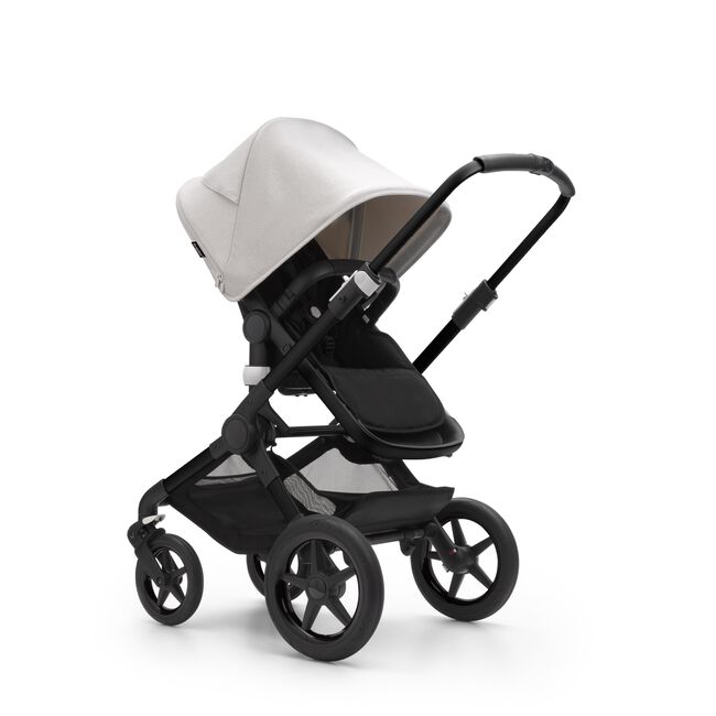 Bugaboo Fox 3 seat stroller with black frame, black fabrics, and white sun canopy. - Main Image Slide 7 of 9