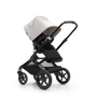 Bugaboo Fox 3 seat stroller with black frame, black fabrics, and white sun canopy. - Thumbnail Slide 7 of 9
