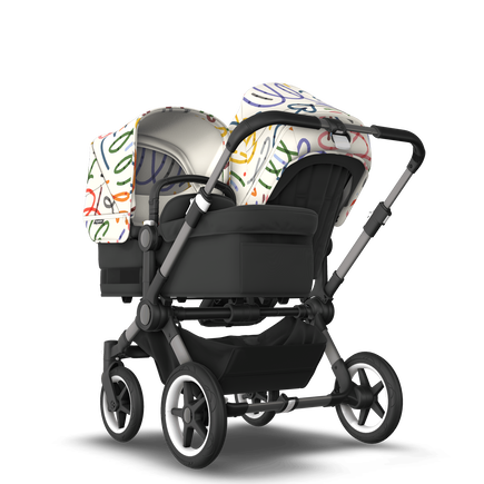Bugaboo Donkey 5 Duo bassinet and seat stroller graphite base, midnight black fabrics, art of discovery white sun canopy