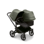 Bugaboo Donkey 5 Duo bassinet and seat stroller black base, midnight black fabrics, forest green sun canopy - Thumbnail Slide 1 of 12