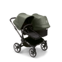 Bugaboo Donkey 5 Duo bassinet and seat stroller graphite base, midnight black fabrics, forest green sun canopy - Thumbnail Slide 1 of 12