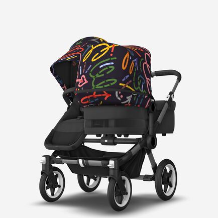 Bugaboo Donkey 5 Duo bassinet and seat stroller graphite base, midnight black fabrics, art of discovery dark blue sun canopy