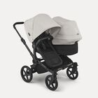 Bugaboo Donkey 6 double stroller black base, heritage black fabrics, misty white sun canopy view 1