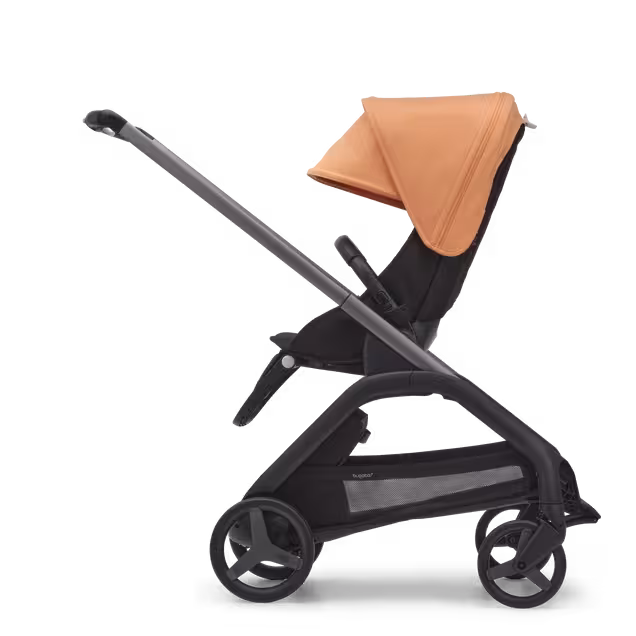 Side view of the Bugaboo Dragonfly seat stroller with graphite chassis, midnight black fabrics and island coral sun canopy. - Main Image Slide 2 of 12