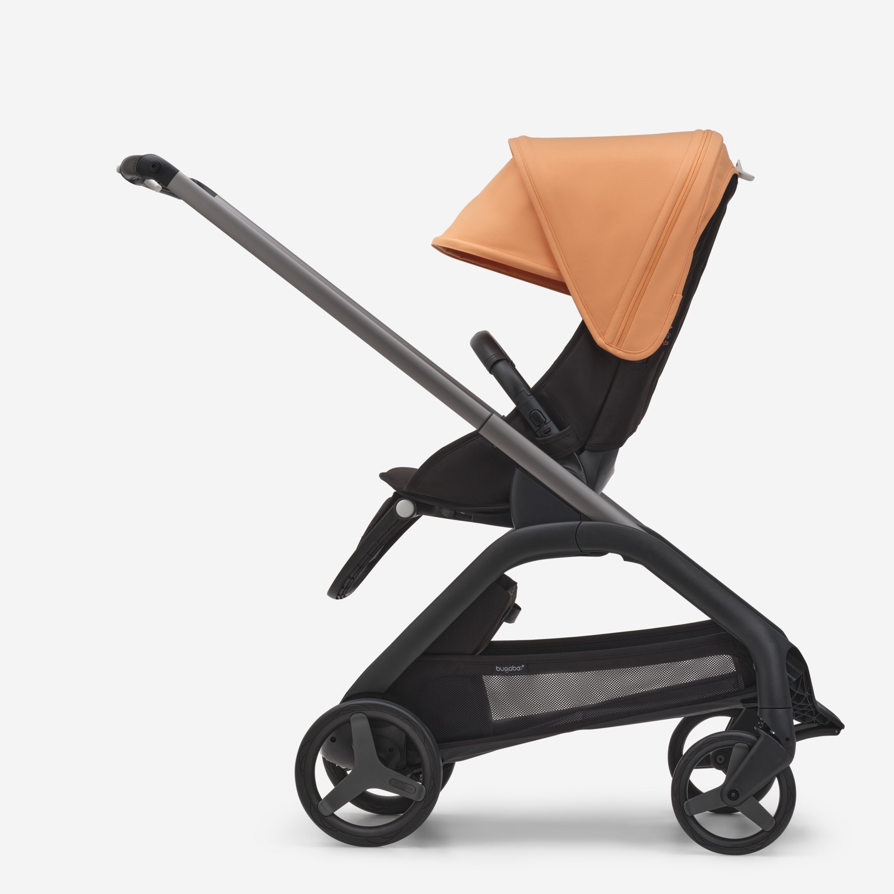 Side view of the Bugaboo Dragonfly seat stroller with graphite chassis, midnight black fabrics and island coral sun canopy. - Main Modal Image Slide 2 of 15