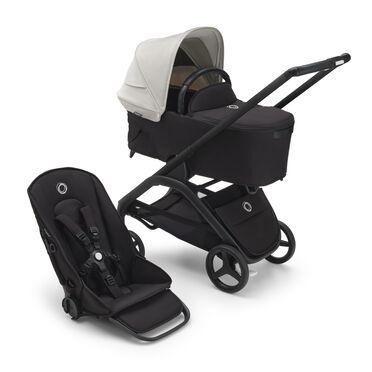 Carrito con silla y capazo Bugaboo Dragonfly con chasis negro, fundas negro medianoche y capota blanco niebla.