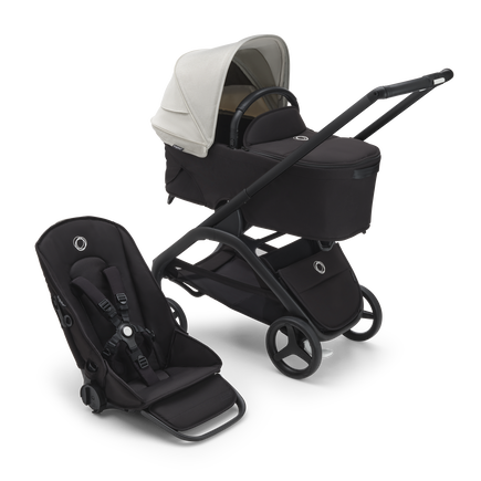 Bugaboo Dragonfly bassinet and seat stroller with black chassis, midnight black fabrics and misty white sun canopy. - view 1