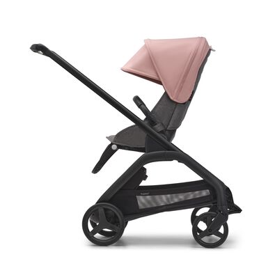 Side view of the Bugaboo Dragonfly seat stroller with black chassis, grey melange fabrics and morning pink sun canopy. - view 2
