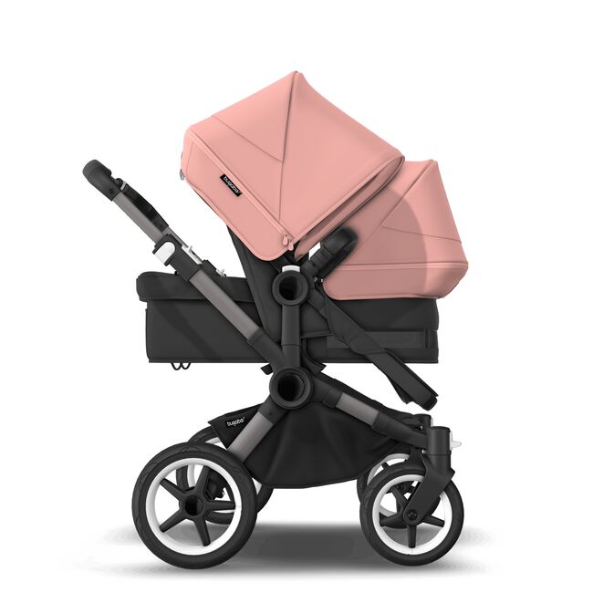 Bugaboo Donkey 5 Duo bassinet and seat stroller graphite base, midnight black fabrics, morning pink sun canopy - Main Image Slide 4 of 12