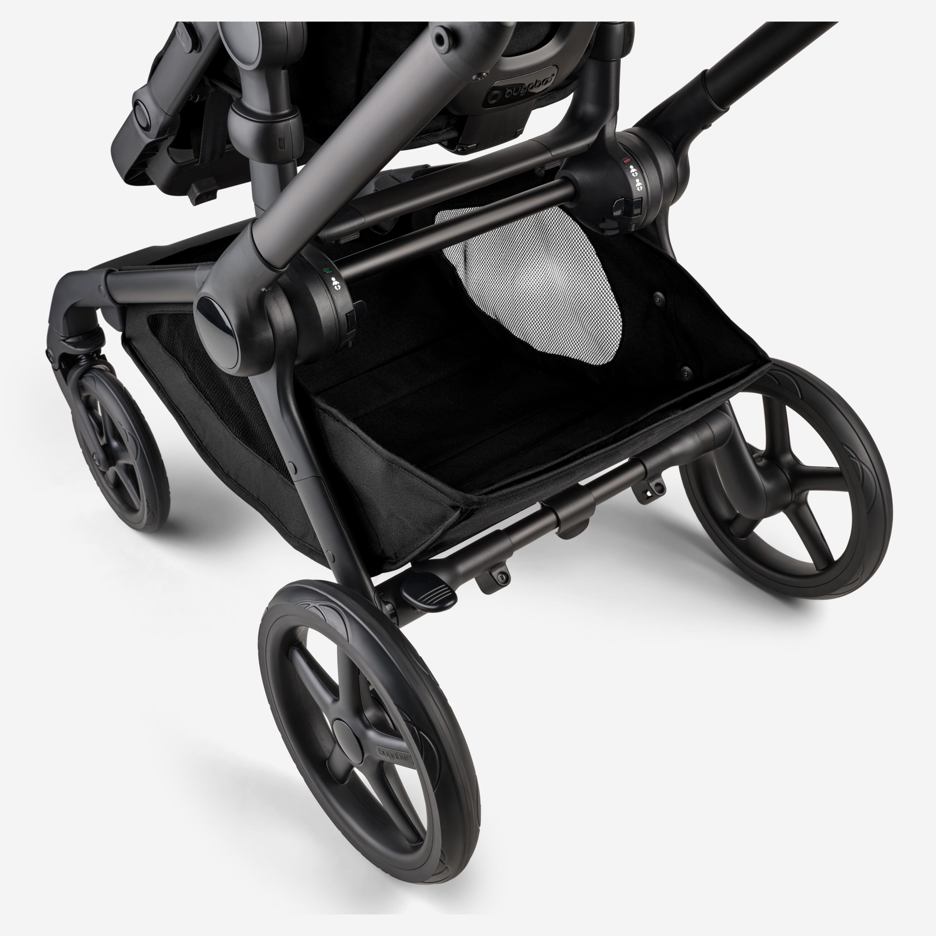 A close-up of the extra-large underseat basket of the Bugaboo Kangaroo 2-in-1 stroller. - Main Modal Image Slide 8 of 18