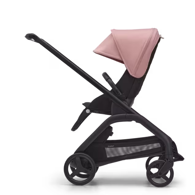 Side view of the Bugaboo Dragonfly seat stroller with black chassis, midnight black fabrics and morning pink sun canopy. - Main Image Slide 2 of 16