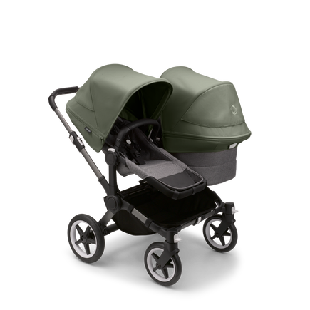 Bugaboo Donkey 5 Duo seat and bassinet stroller with graphite chassis, grey melange fabrics and forest green sun canopy.