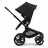 Seitenansicht des Bugaboo Fox 5-Sitz-Kinderwagens mit schwarzem Fahrgestell, mitternachtsschwarzen Stoffen und mitternachtsschwarzem Sonnendach. - Thumbnail Slide 3 of 13