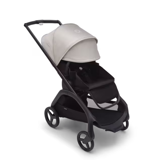 Bugaboo Dragonfly seat stroller with black chassis, midnight black fabrics and misty white sun canopy. The sun canopy is fully extended. - Main Image Slide 3 of 16