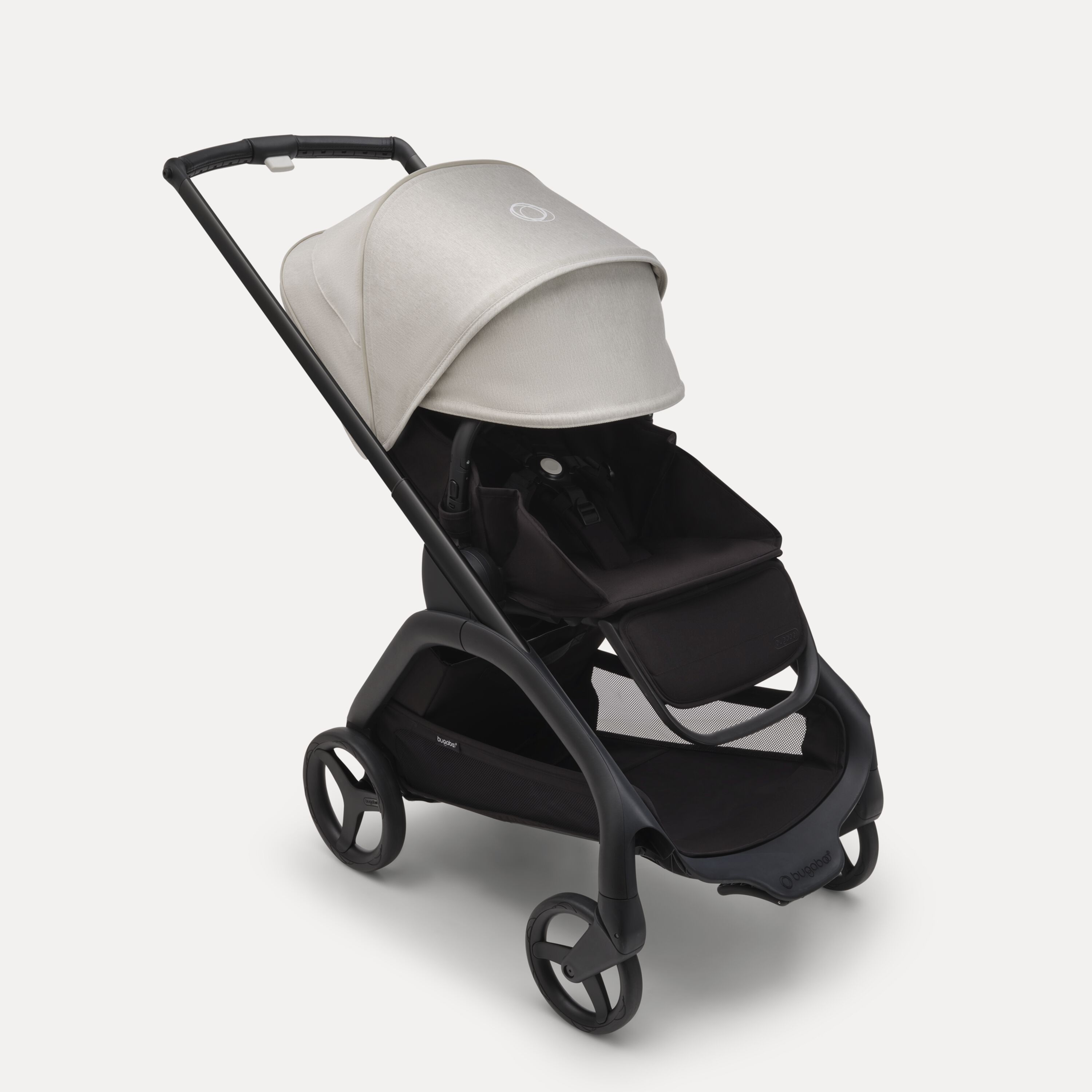 Bugaboo Dragonfly seat stroller with black chassis, midnight black fabrics and misty white sun canopy. The sun canopy is fully extended. - Main Modal Image Slide 3 of 16