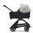 Vista laterale del passeggino con navicella Bugaboo Dragonfly con telaio black, tessuti midnight black e cappottina misty white. - Thumbnail Slide 3 of 16