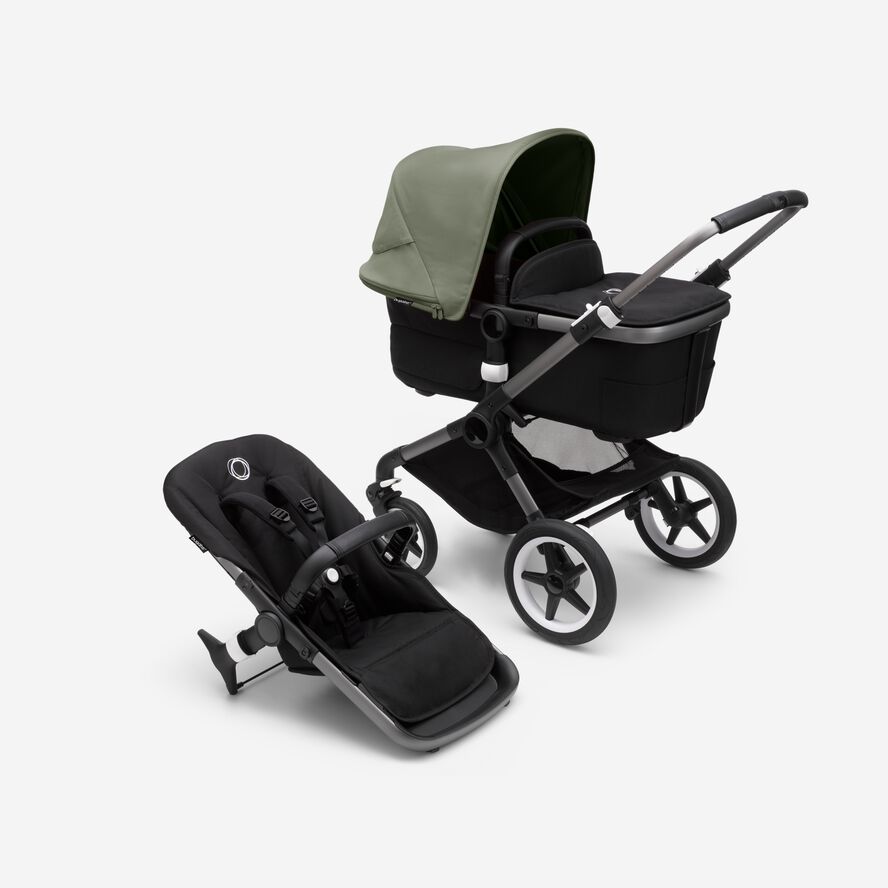 Bugaboo Fox 3 bassinet and seat stroller with graphite frame, black fabrics, and forest green sun canopy.