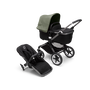 Bugaboo Fox 3 bassinet and seat stroller with graphite frame, black fabrics, and forest green sun canopy. - Thumbnail Slide 1 of 7