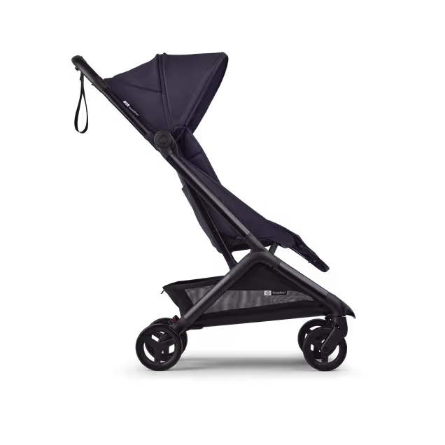 Side view of a Bugaboo Butterfly 2 ultra-compact travel pram with black chassis, Deep Indigo fabrics, and Deep Indigo sun canopy. - Main Image Slide 2 of 9